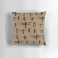 Pillow featuring a vibrant, nature-inspired insect pattern design.