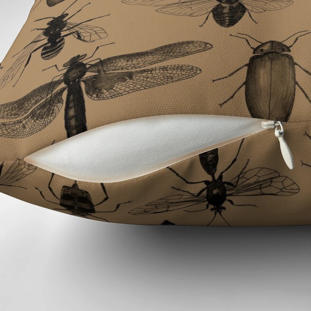 Pillow featuring a vibrant, nature-inspired insect pattern design.