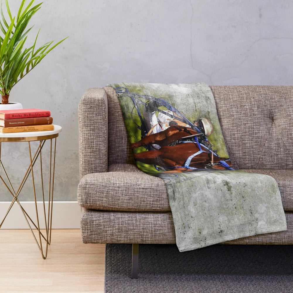 Plush blanket featuring a harness horse racing design