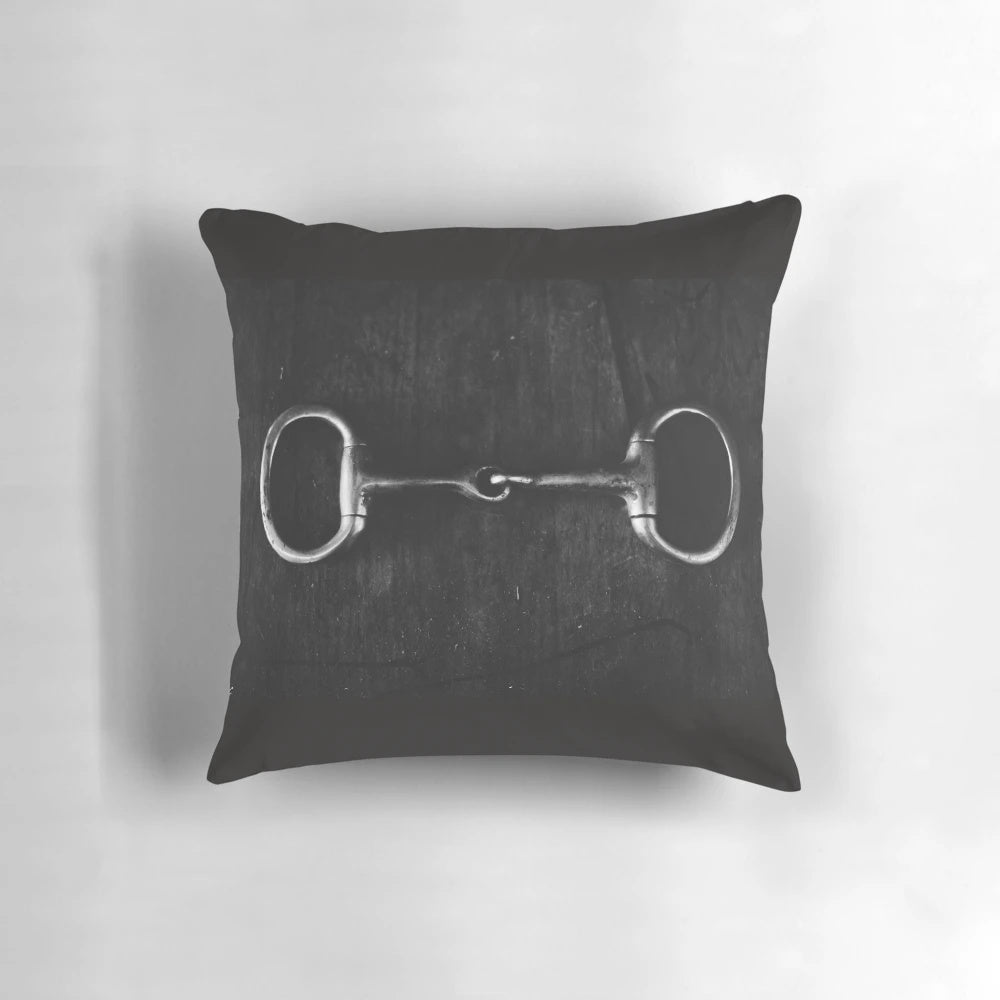 Snaffle-shaped decorative pillow with an equestrian-inspired design