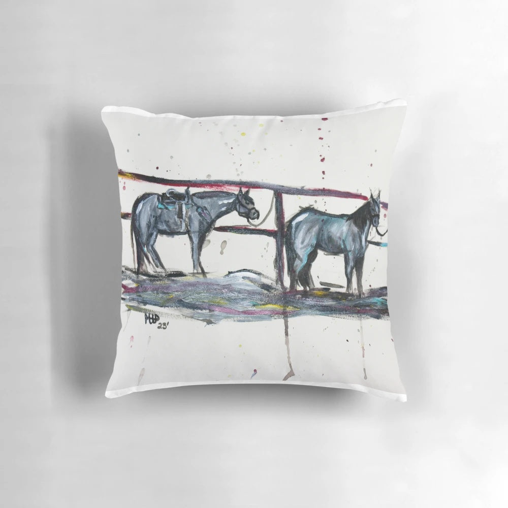 A colorful abstract pillow featuring horses and western-inspired elements, perfect for adding rustic charm to your home.