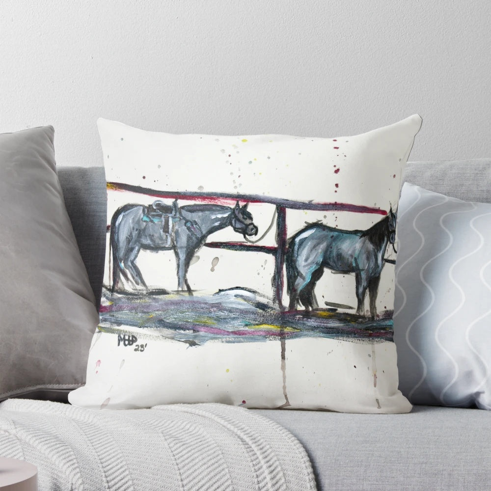 A colorful abstract pillow featuring horses and western-inspired elements, perfect for adding rustic charm to your home.