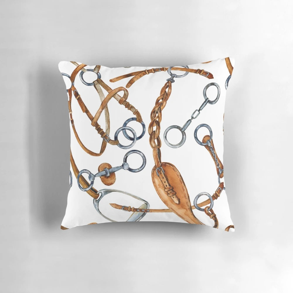 Equestrian-themed pillow with a watercolor pattern of horses and equestrian gear against a seamless background.