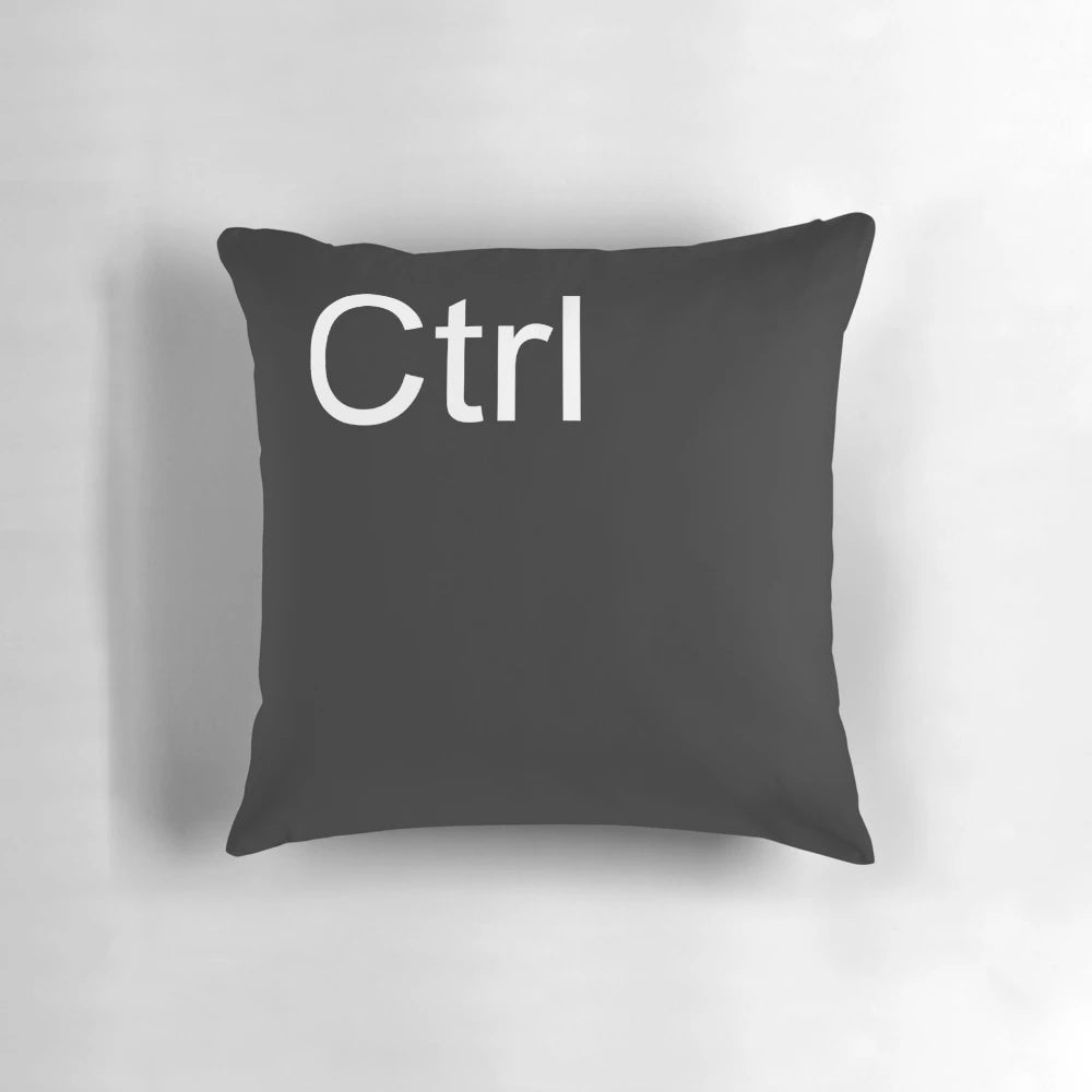Black Ctrl Pillow, a comfortable and functional accessory for computer enthusiasts.