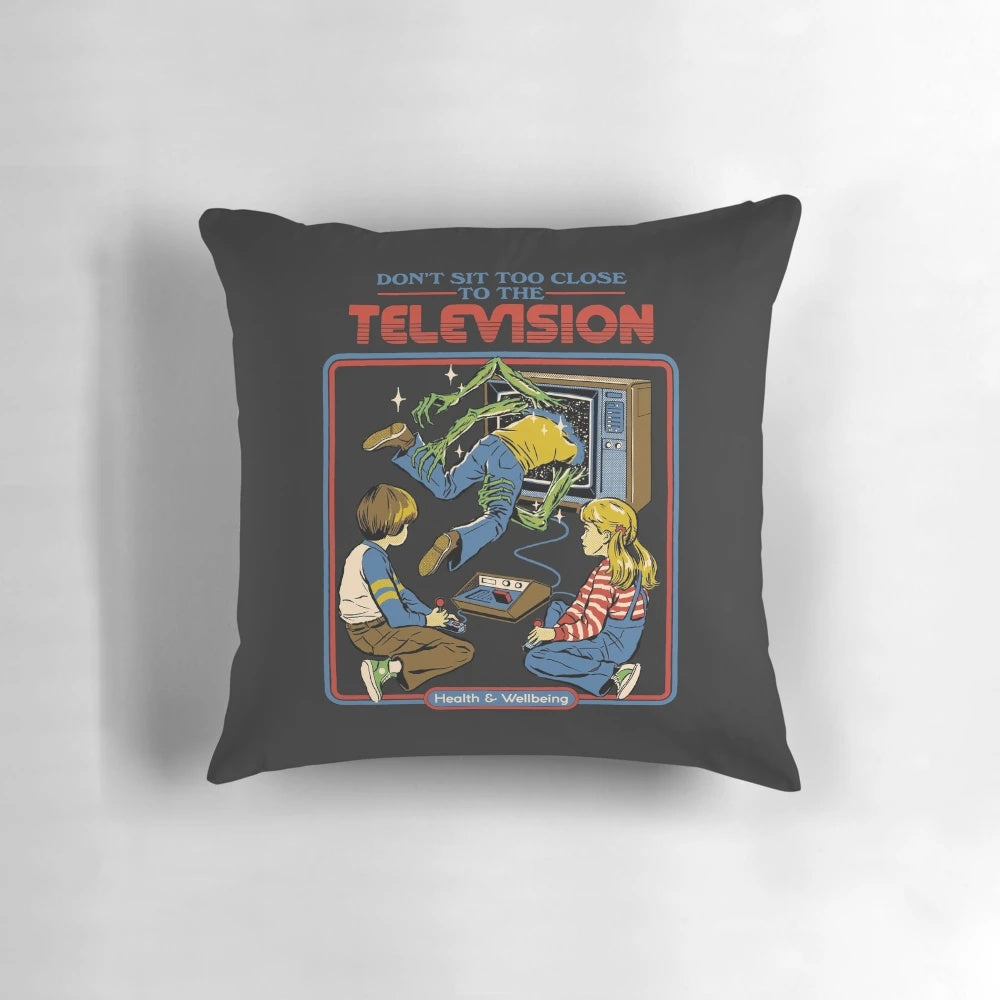 Closeup of a plush pillow with a vintage video game design, optimized for comfortable gaming.