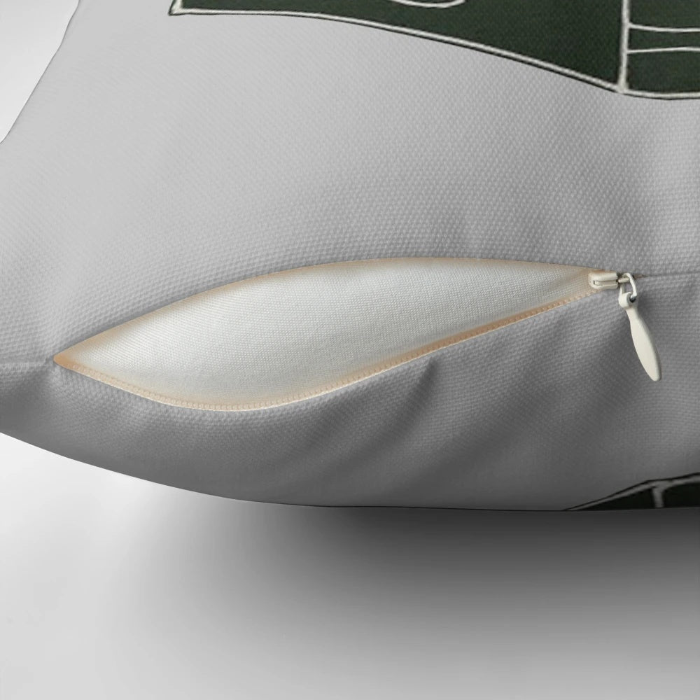 A soft, plush pillow with a design featuring an open book and the words "We Lose Ourselves in Books...