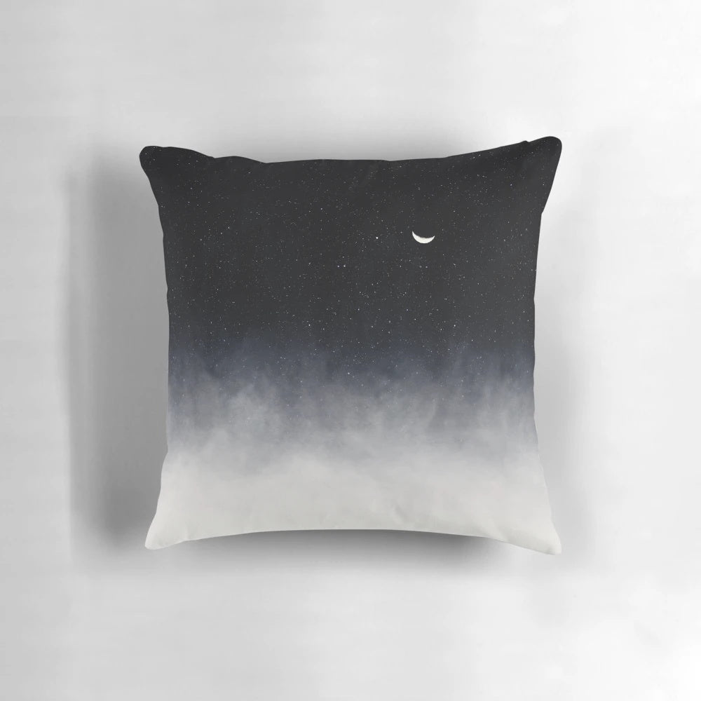 Pillow featuring a dreamy, celestial landscape design with a moon, stars, and clouds.
