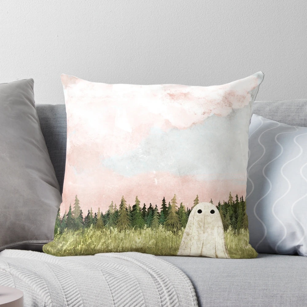 Pillow featuring a dreamy, cotton candy-colored sky with wispy clouds over a haunting spring meadow