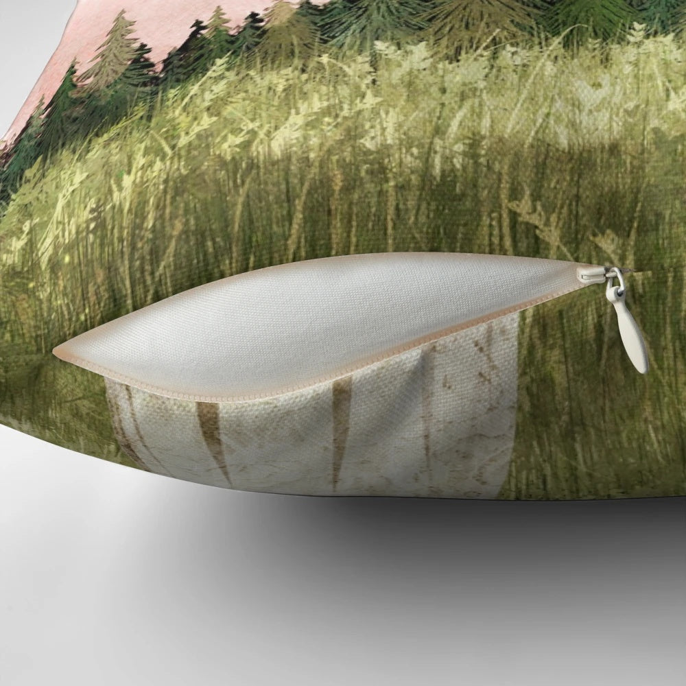Pillow featuring a dreamy, cotton candy-colored sky with wispy clouds over a haunting spring meadow