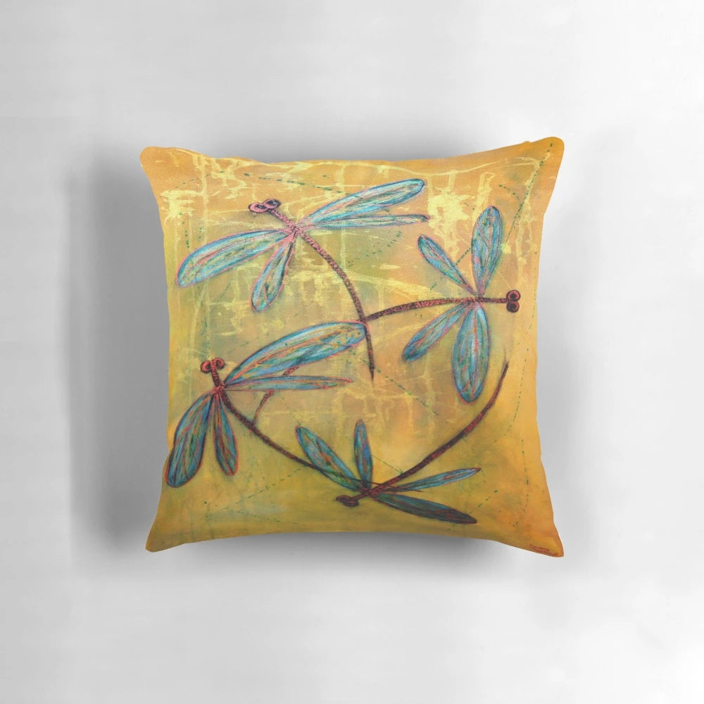 Decorative pillow featuring a dreamy, ethereal design of dragonflies and butterflies in flight.