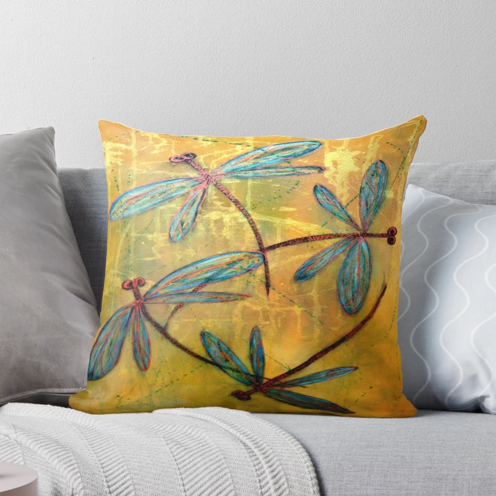 Decorative pillow featuring a dreamy, ethereal design of dragonflies and butterflies in flight.