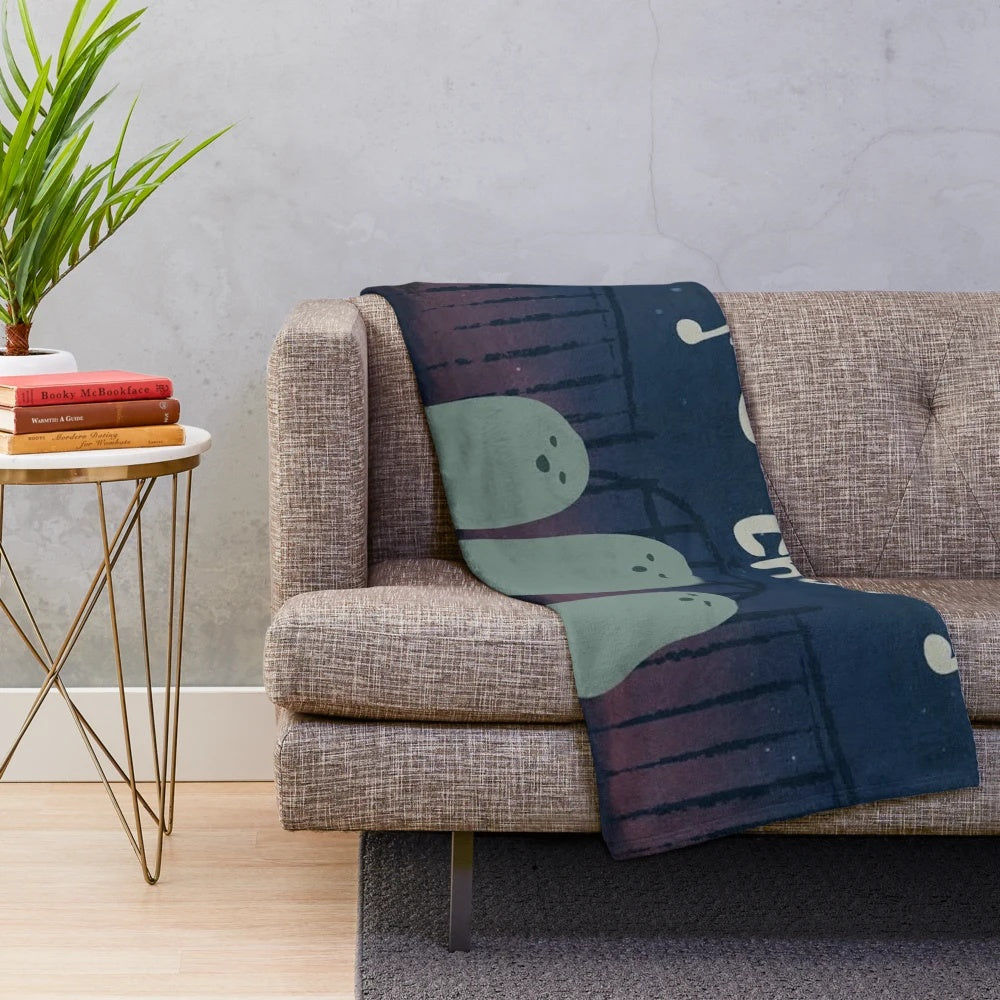 Ghost choir plush blanket with musical notes and spooky elements