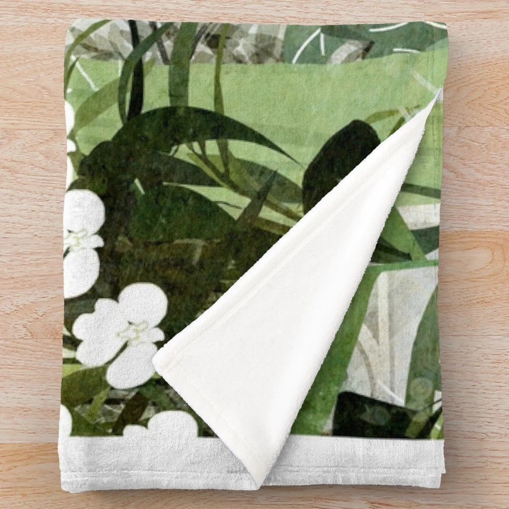 Plush blanket with ghostly greenhouse design, featuring nature elements and a whimsical, vintage-inspired style.
