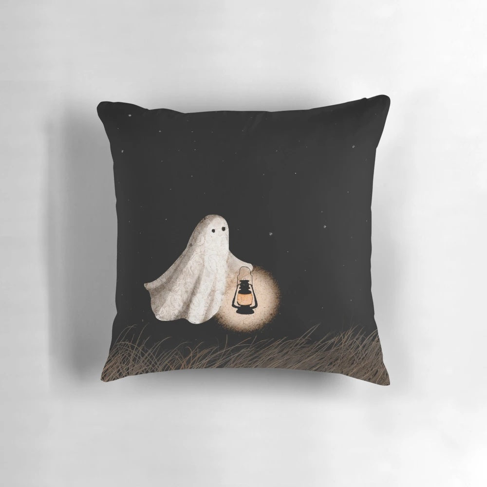 Ghostly pillow with lantern lighting and starry night sky backdrop