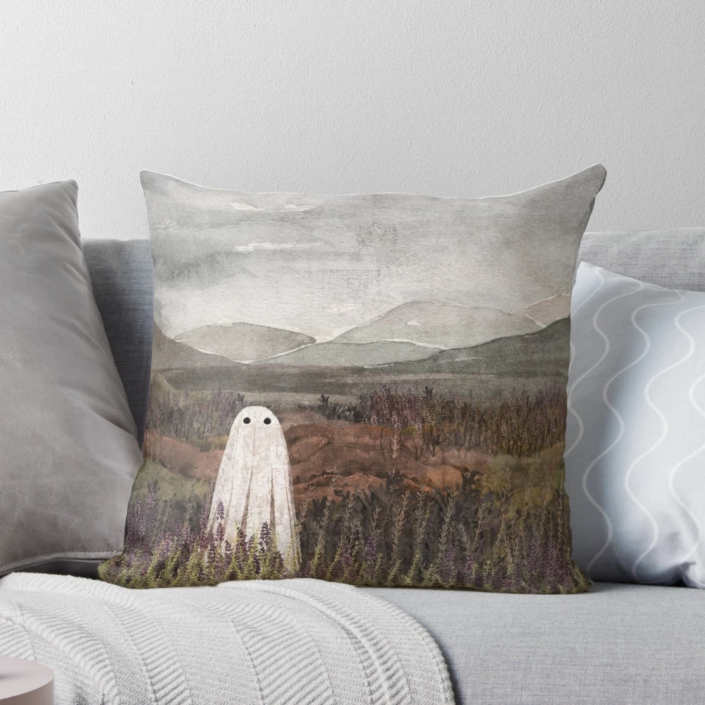 Soft, plush pillow featuring a watercolor painting of a misty, heather-covered Scottish mountain landscape with a ghostly, ethereal presence.