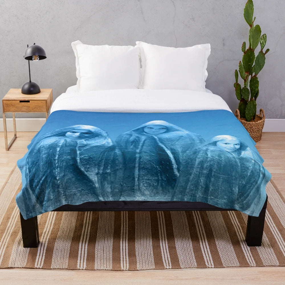 Plush blanket with an ice blue sky and abstract nature-inspired design