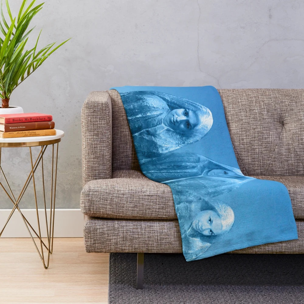 Plush blanket with an ice blue sky and abstract nature-inspired design