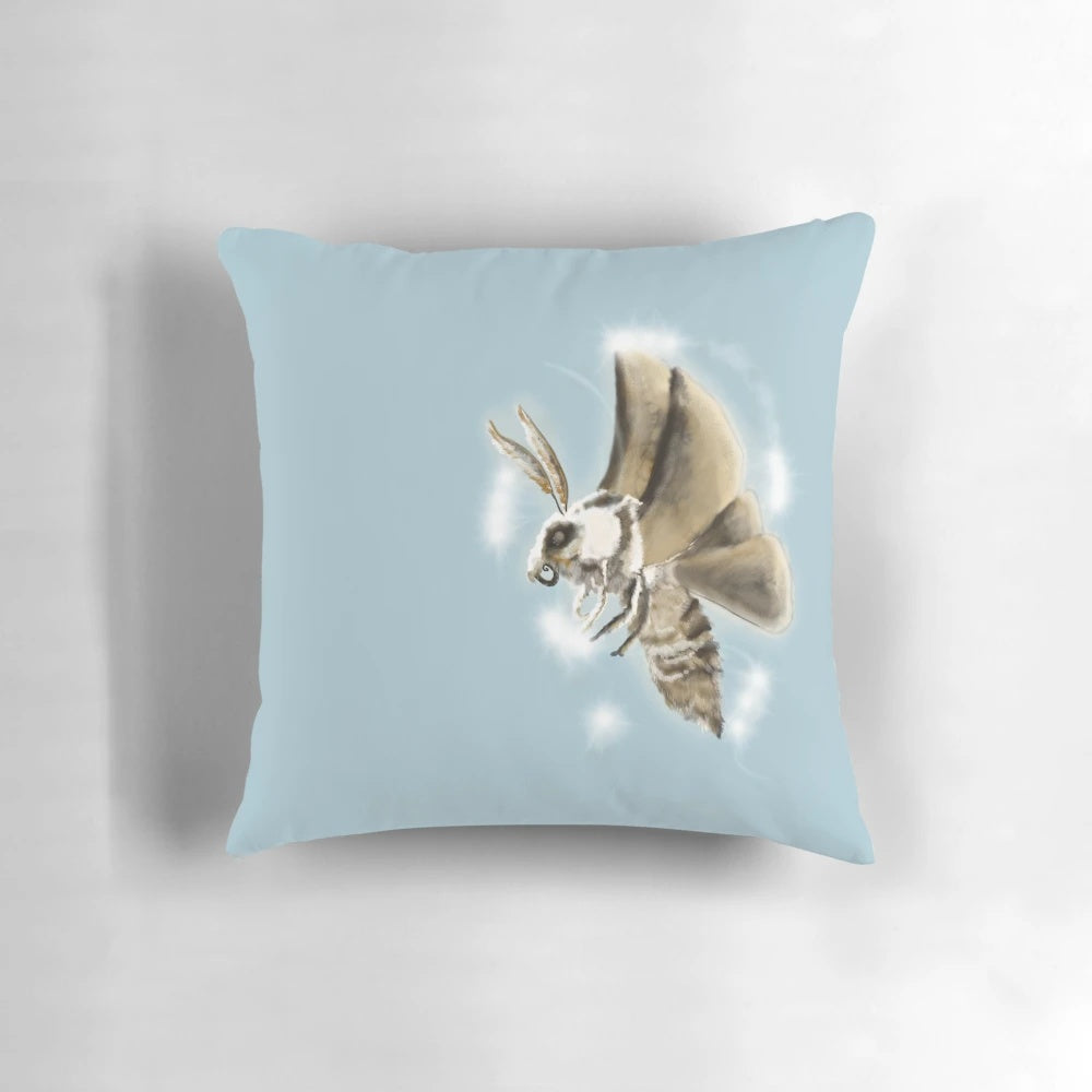 Soft, delicate moth wisp pillow with a whimsical, nature-inspired design