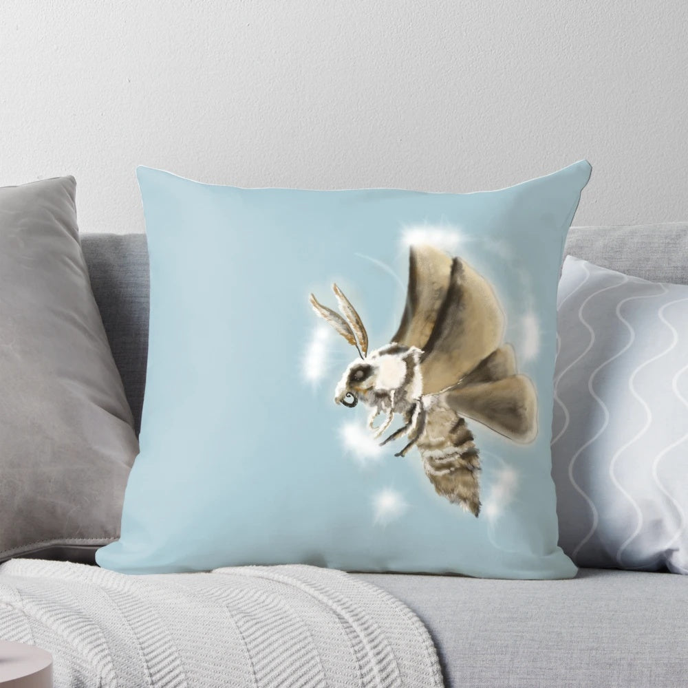 Soft, delicate moth wisp pillow with a whimsical, nature-inspired design