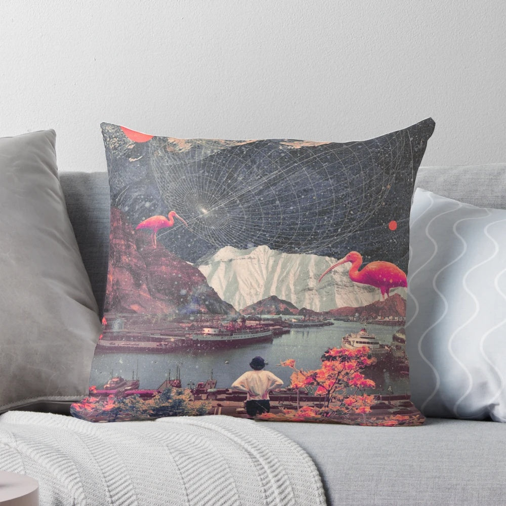 A vintage-inspired collage pillow featuring a solitary woman amidst a surreal landscape of mountains, flamingos, and floral elements.