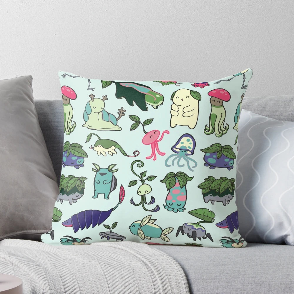 A whimsical pillow featuring a colorful pattern inspired by the spirits and characters of Avatar: The Last Airbender and The Legend of Korra.