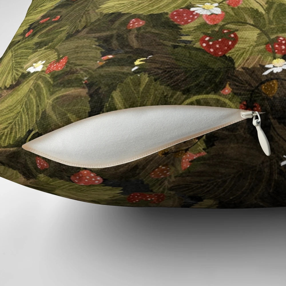 Soft, artistic pillow featuring a field of whimsical strawberries and ghostly apparitions