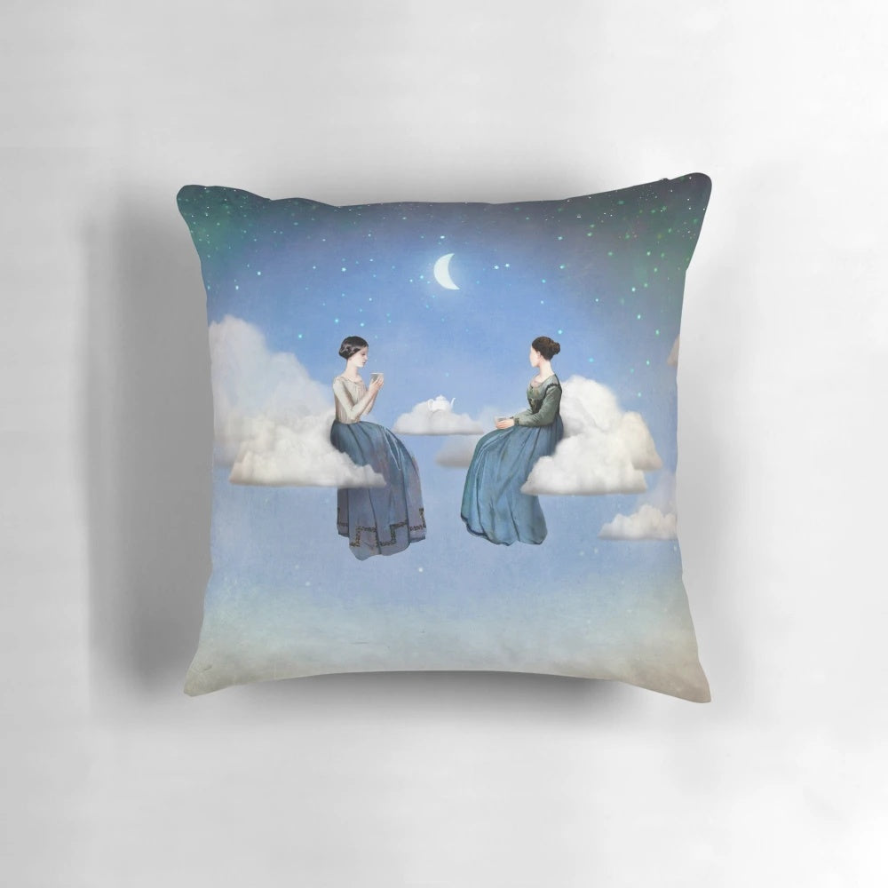 Soft, dreamy pillow featuring a design of wind, clouds, and a woman drinking tea under a starry night sky.