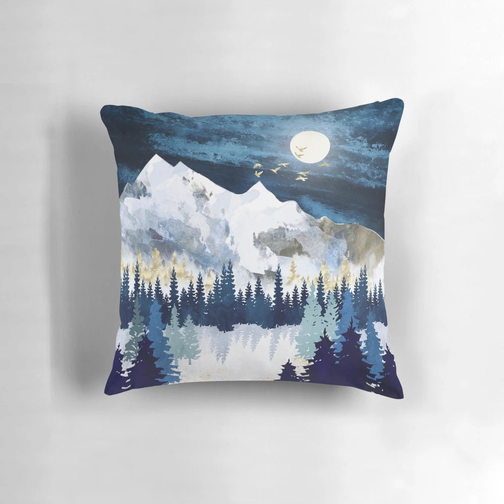 Serene blue and white winter landscape pillow cover featuring a moonlit forest scene.
