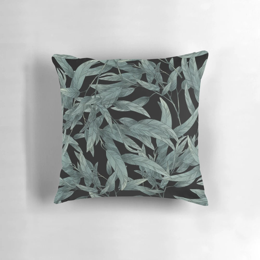 Eucalyptus leaves hand-drawn graphic on a black and white modern pillow