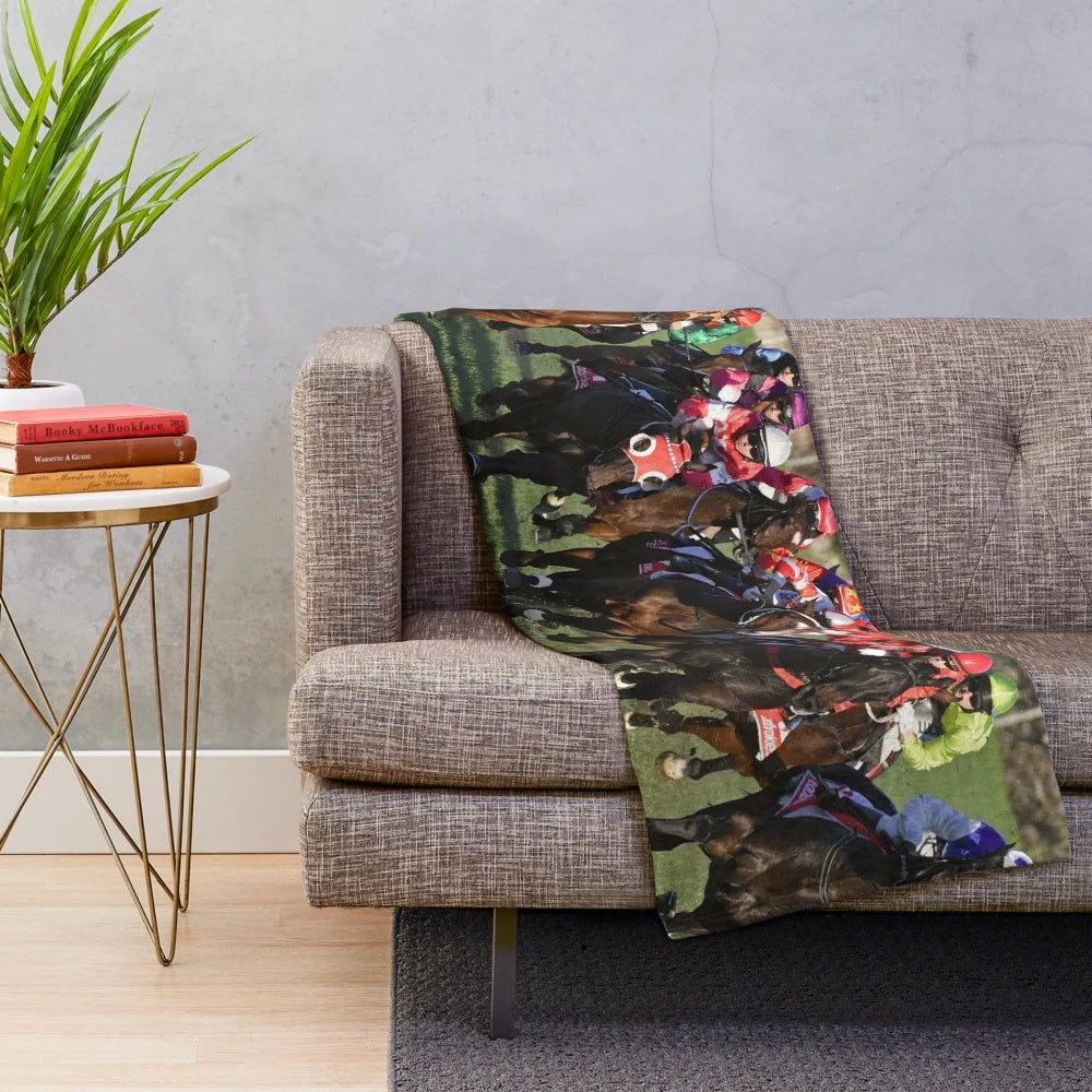 Plush blanket featuring a horse racing action scene