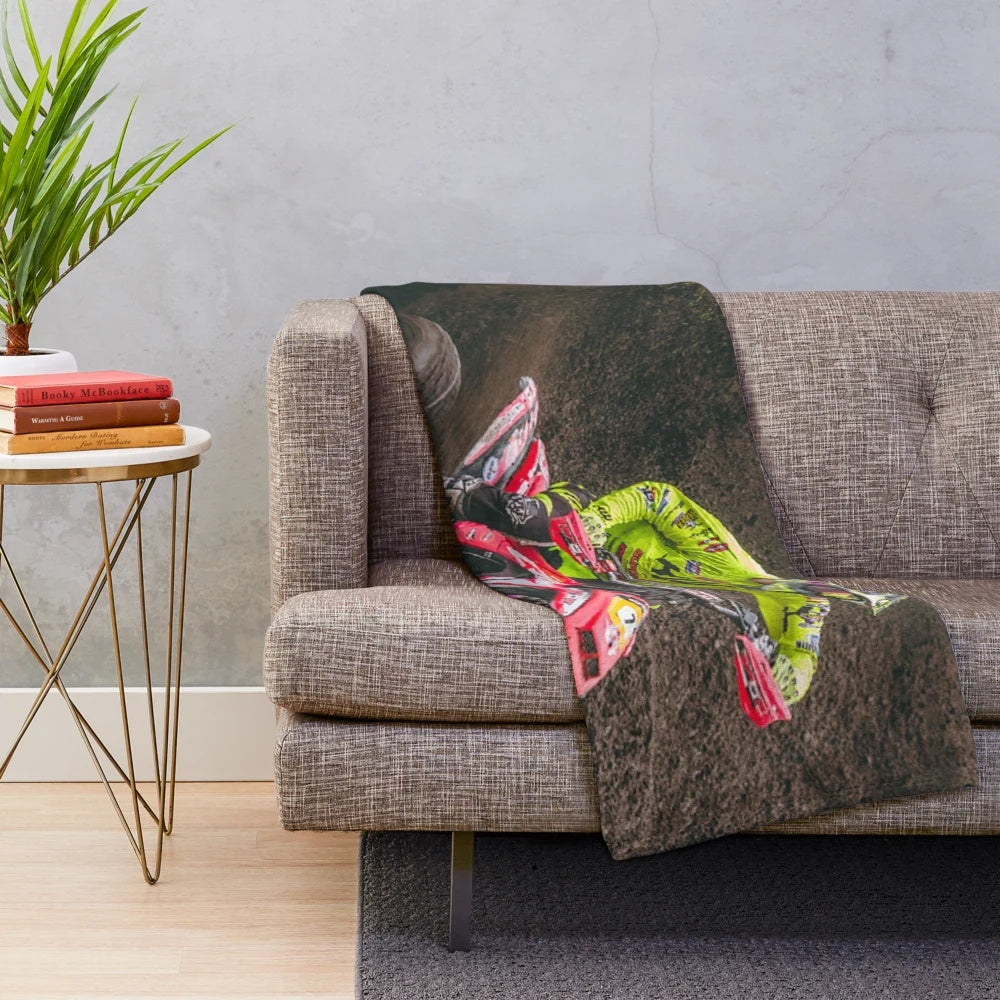 Plush blanket featuring an ATV quad racing through the mud