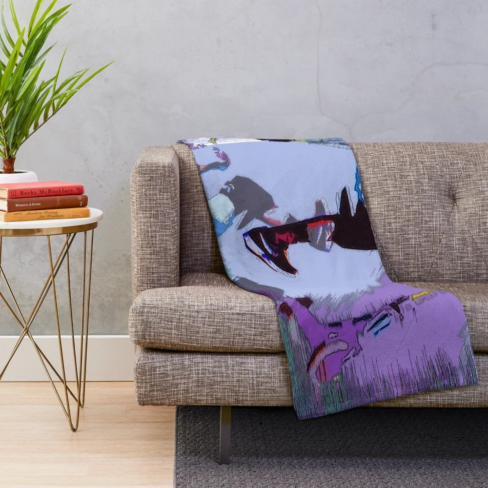 Plush blanket featuring a scooter rider performing tricks