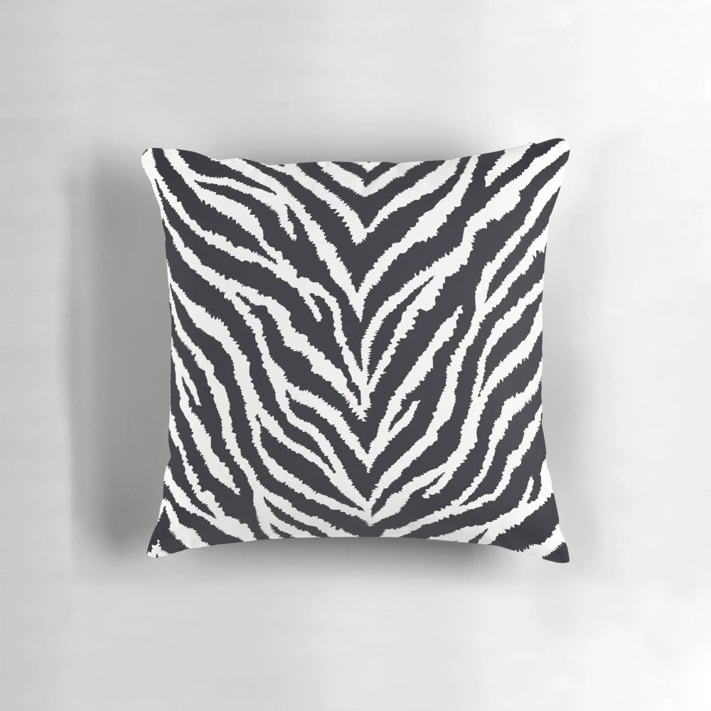 Closeup of a high-quality zebra fur print decorative pillow with a realistic, detailed animal pattern.