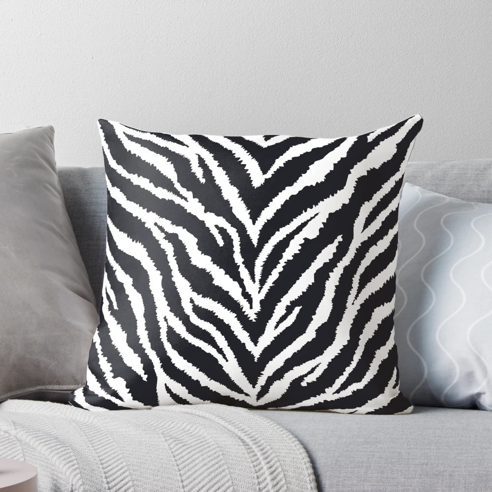 Closeup of a high-quality zebra fur print decorative pillow with a realistic, detailed animal pattern.