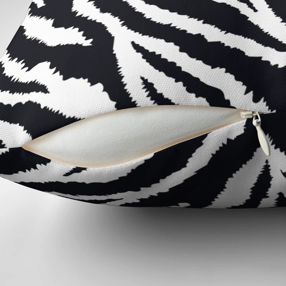 Closeup of a high-quality zebra fur print decorative pillow with a realistic, detailed animal pattern.