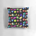 A colorful 3D shapes pillow featuring spheres and cubes, designed to teach children about geometry.