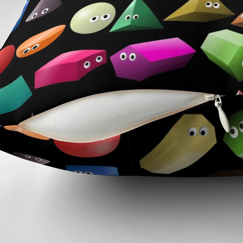 A colorful 3D shapes pillow featuring spheres and cubes, designed to teach children about geometry.