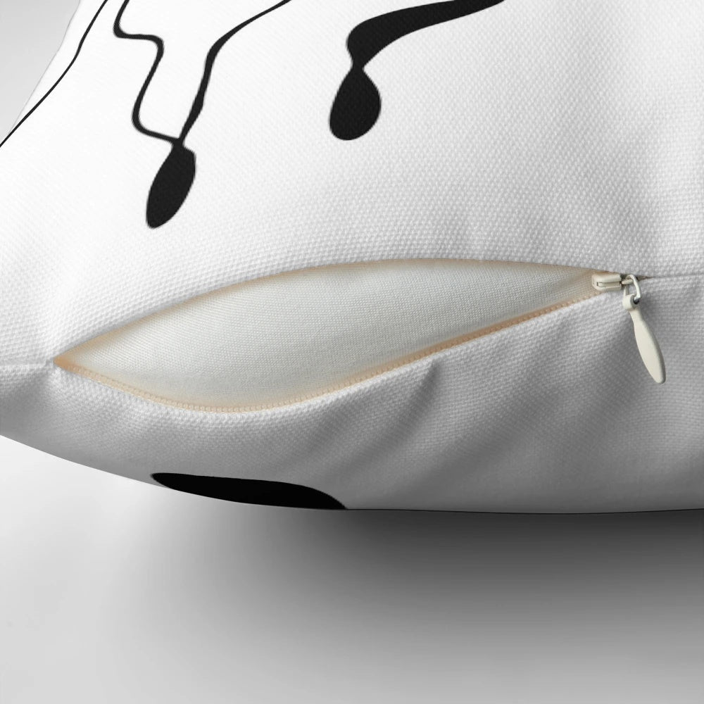An artistic pillow featuring a detailed illustration of an ant on a dynamic journey.
