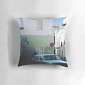 Portugal Pillow POD featuring a scenic blue road and old town buildings