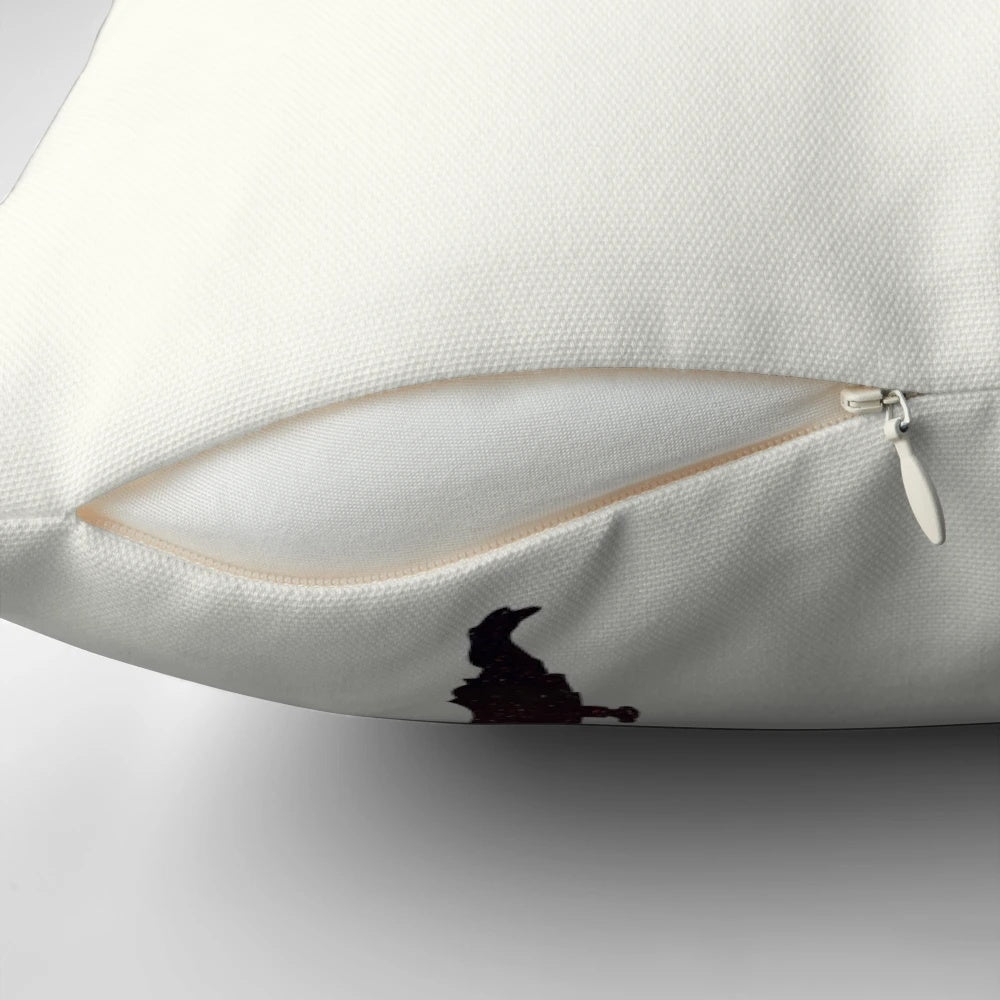Pillow with a colorful, space-inspired design featuring planets, galaxies, and celestial elements.