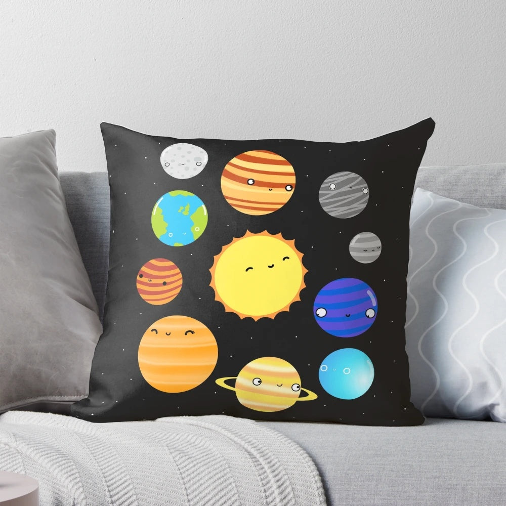 A colorful and whimsical pillow featuring illustrations of the planets in the solar system.