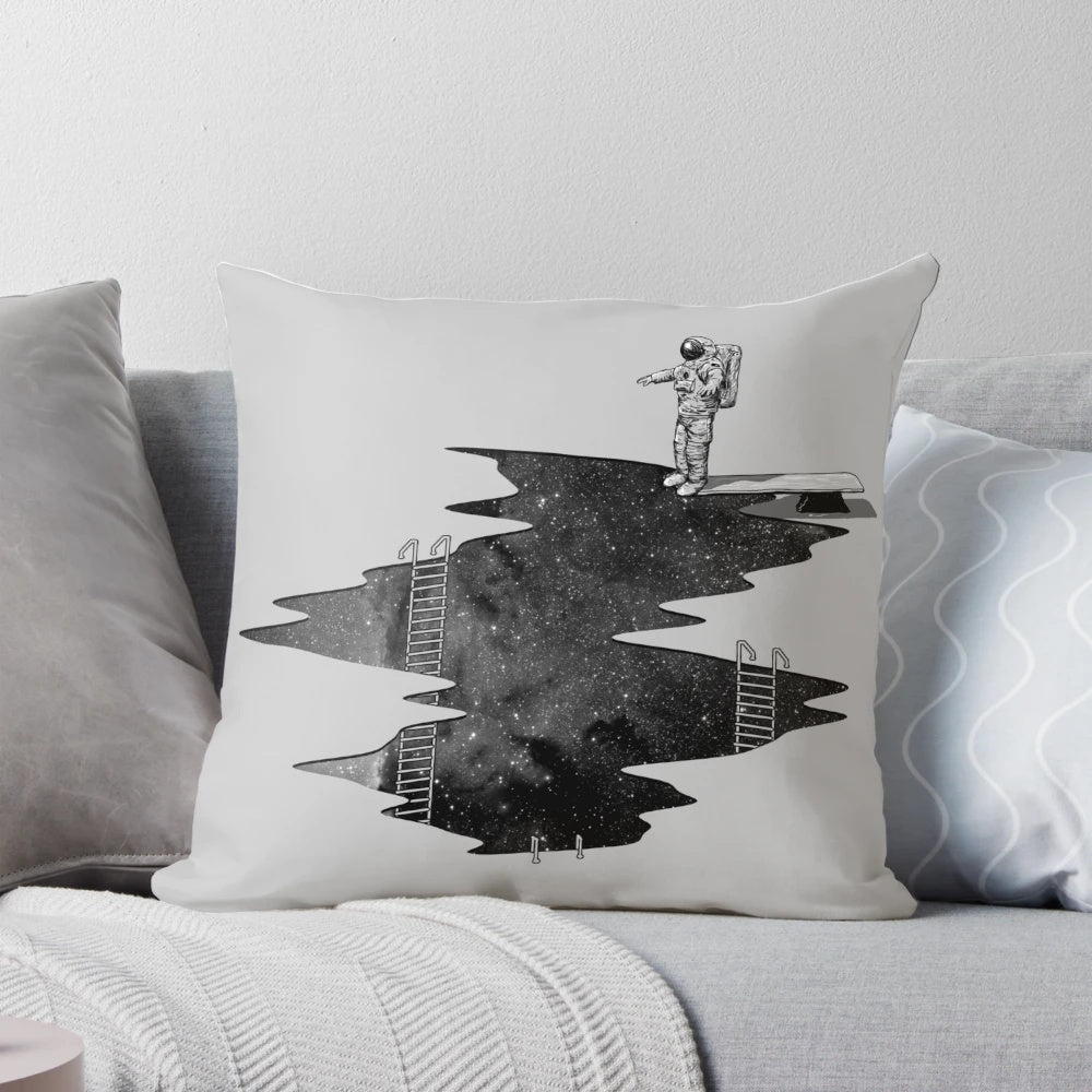 A plush pillow featuring an astronaut diving through the stars and galaxies of outer space.