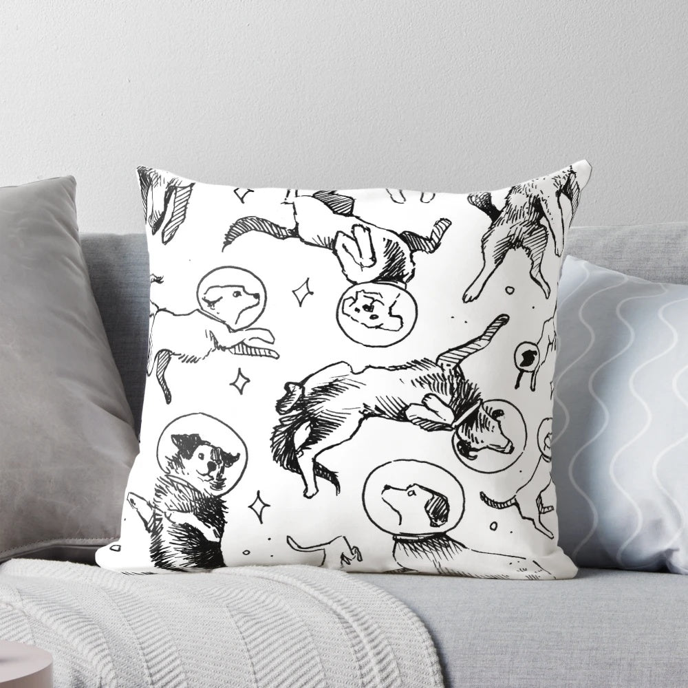 Pillow featuring a whimsical pattern of dogs exploring space, astronauts, and the galaxy.
