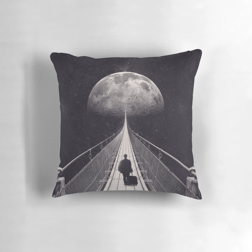A surreal, space-themed pillow with stars, a moon, and a lone astronaut floating in the galaxy.