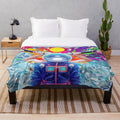 Alien-inspired plush blanket with vibrant cosmic design