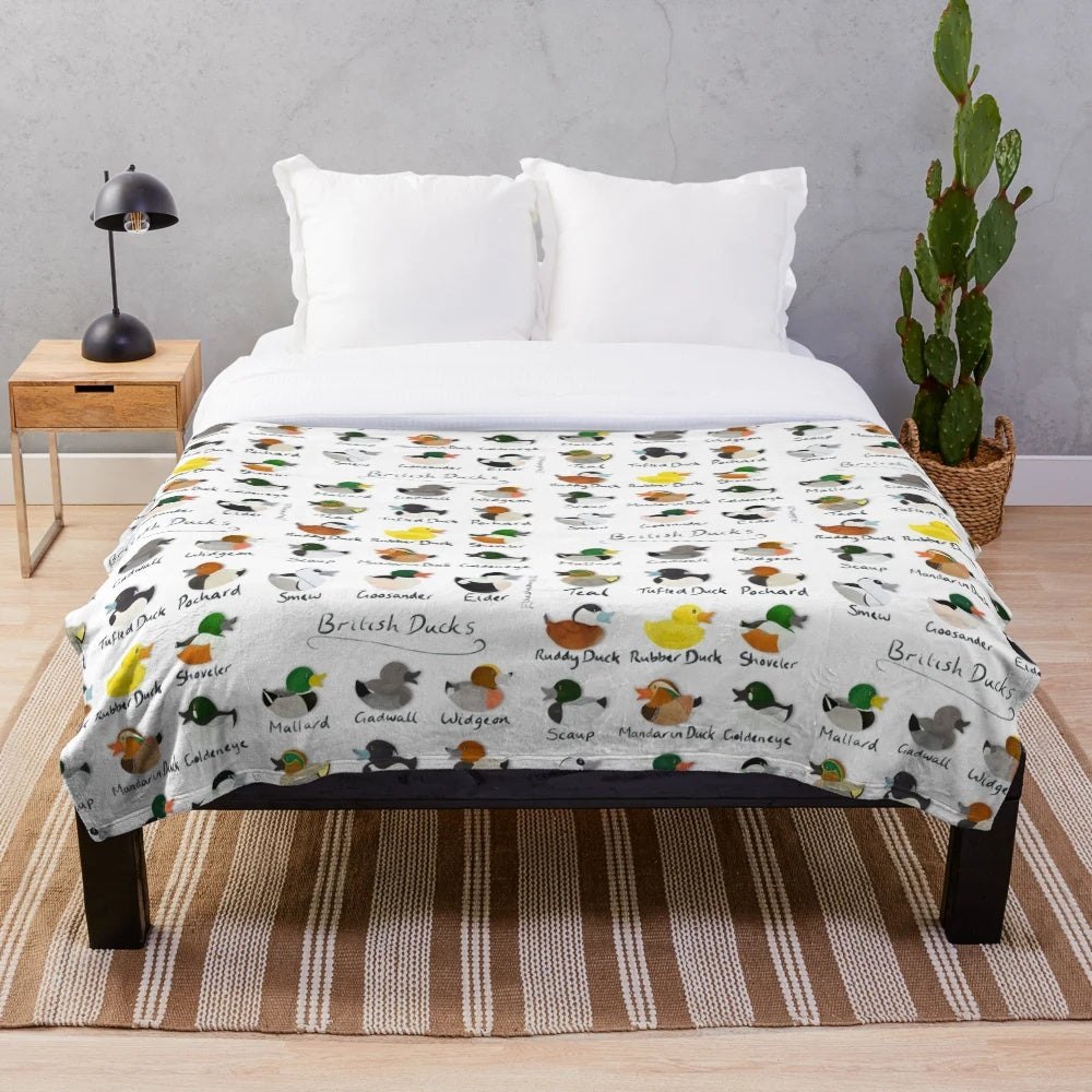 Plush blanket featuring a guide to British ducks by Elliestrations