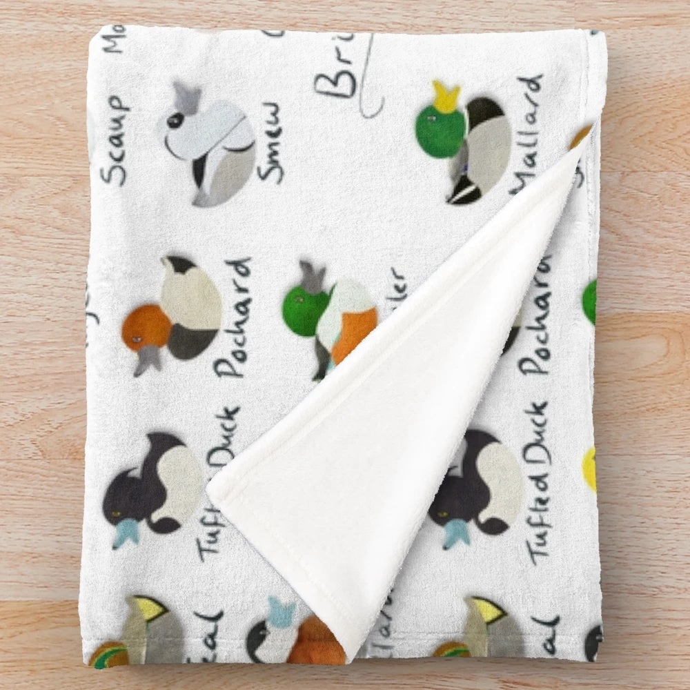 Plush blanket featuring a guide to British ducks by Elliestrations