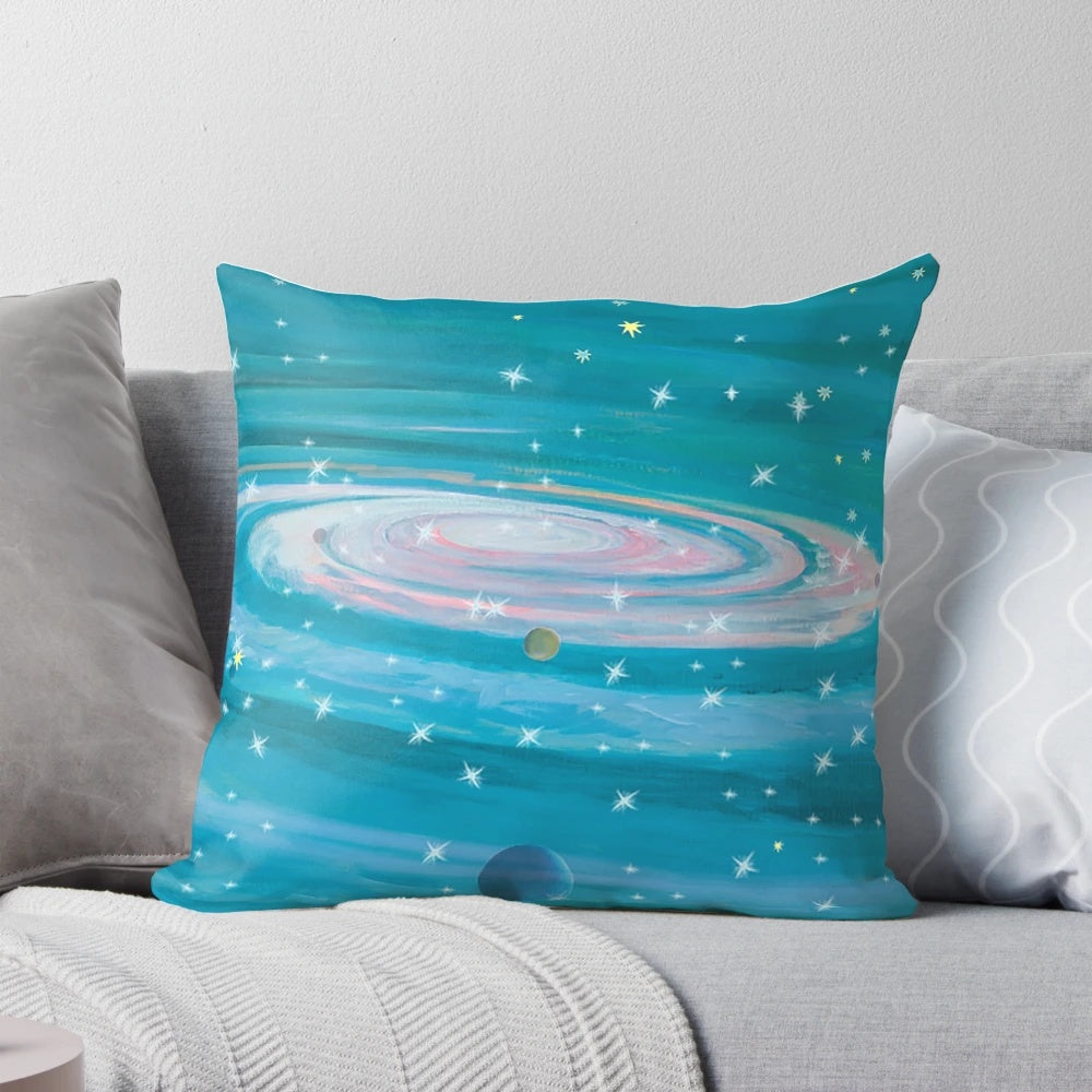 Colorful pillow design featuring stars, planets, and cosmic elements for a space-themed travel experience.