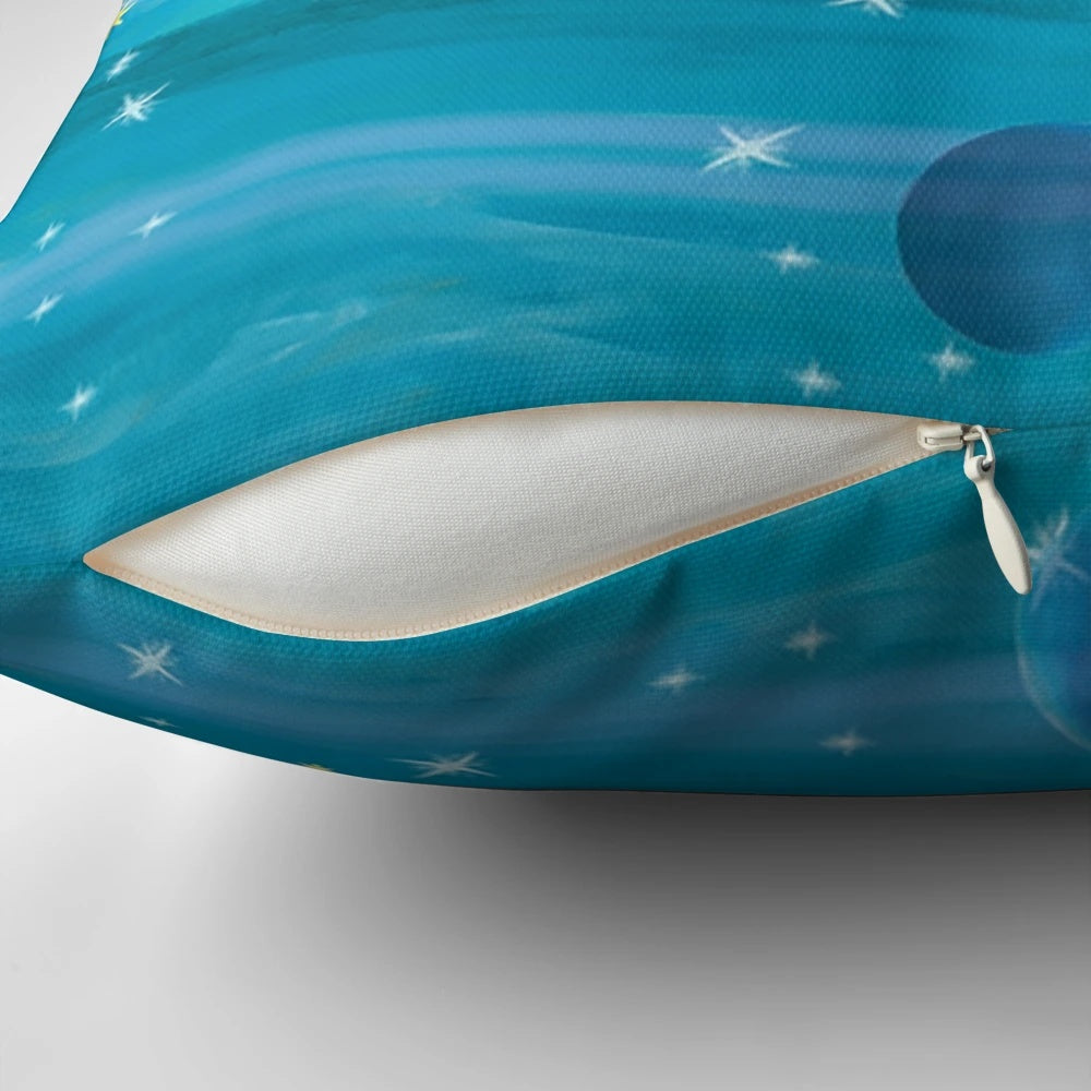 Colorful pillow design featuring stars, planets, and cosmic elements for a space-themed travel experience.