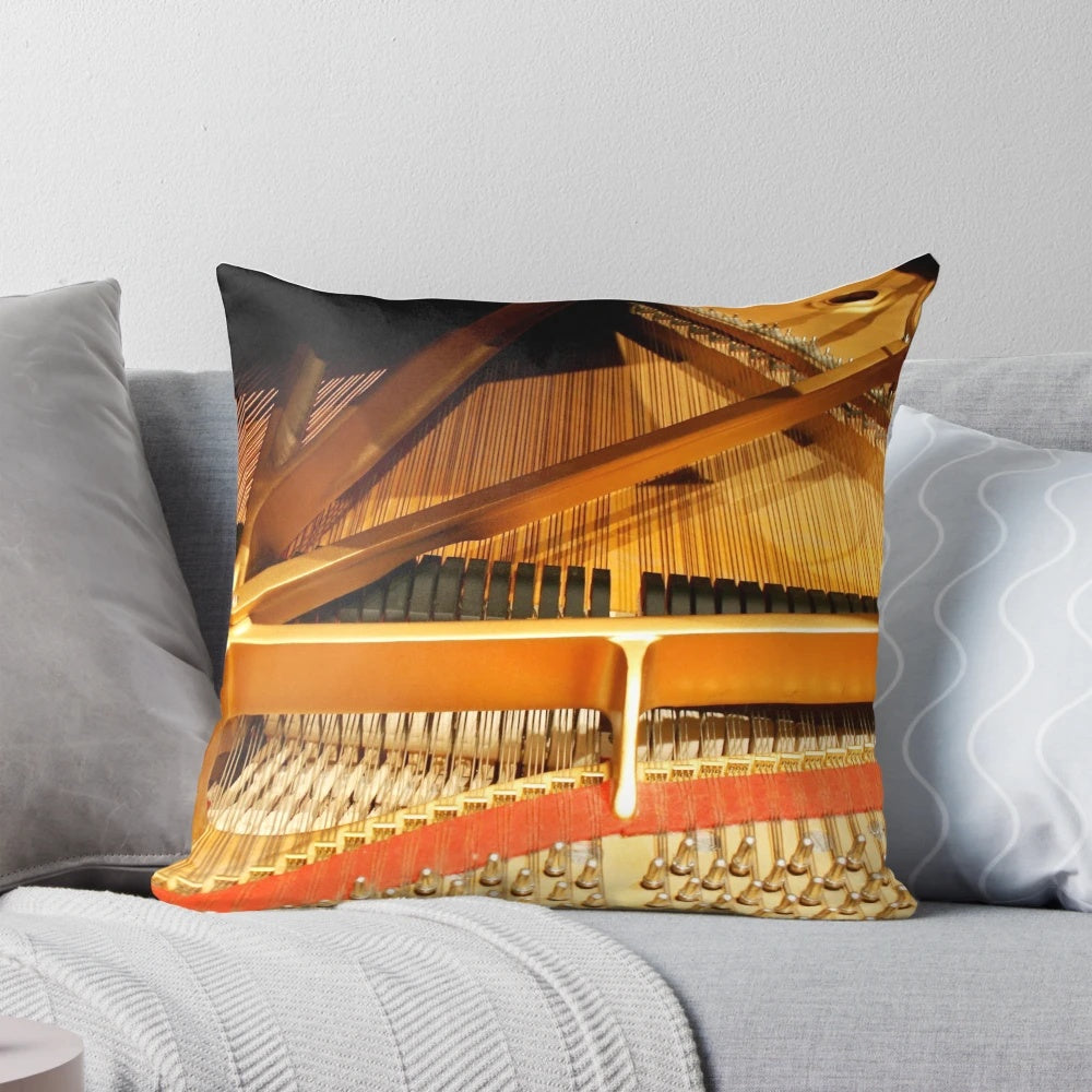 A Steinway concert grand piano with its intricate inner mechanisms and strings displayed on a pillow.